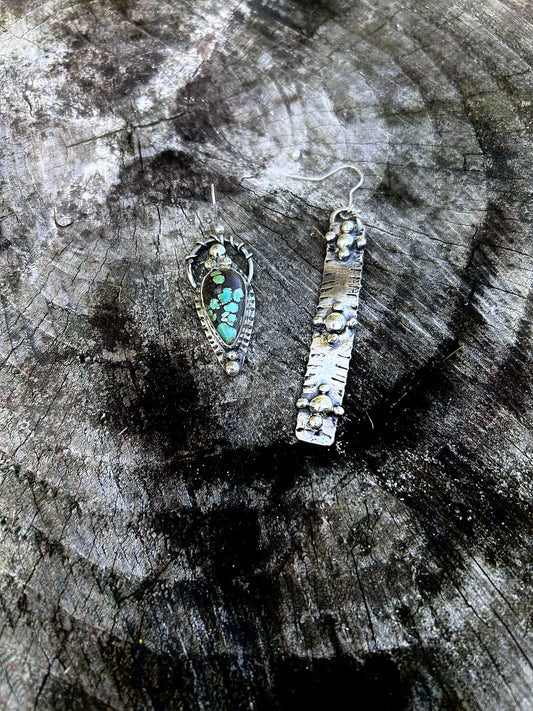 Boucles d'oreilles dépareillées